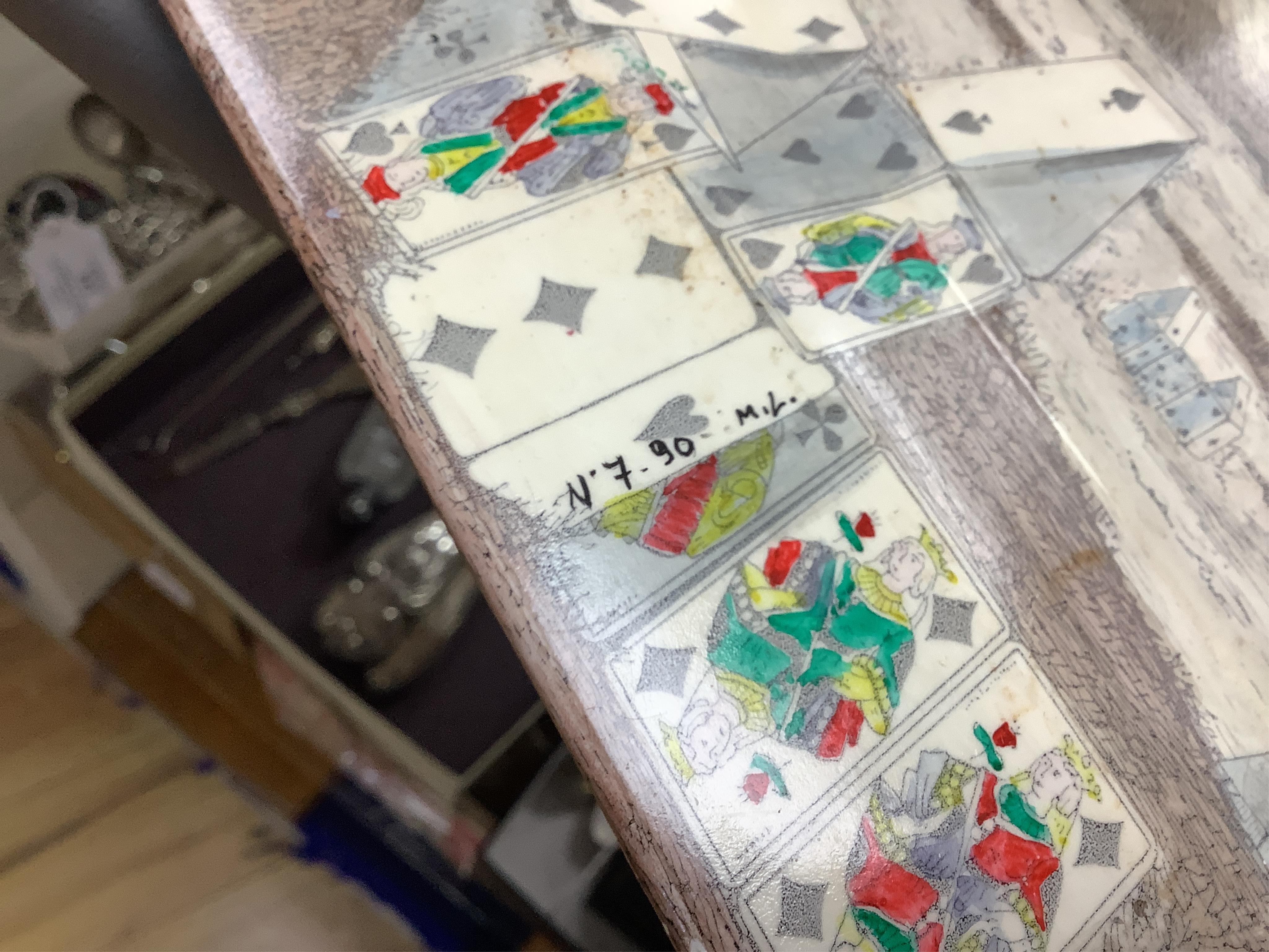 A Fornasetti 'Citta di Carte' (City of Cards) rectangular tin tray, 59cm wide